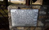 cmentarz wojenny z 1914 r. w Pilicy-Biskupicach - tablica informacyjna